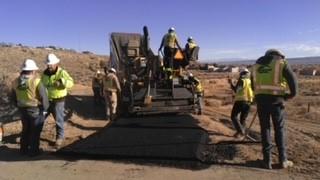 Workers paving the Sagebrush Trail
